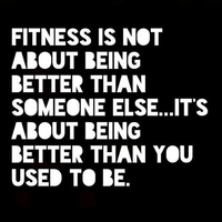 A sign that says, \"Fitness is not about being better than someone else...it\'s about being better than you used to be.\"
